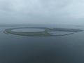 IJsseloog is an artificial island in the middle of the Ketelmeer that aims to store contaminated sludge from the bottom Royalty Free Stock Photo