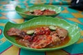 Ikan Pecak Betawi Traditional fried fish with spicy herbs sauce