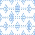 Ikat damask seamless pattern. Blue diamonds on a white background