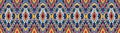 Ikat geometric folklore ornament. Tribal ethnic vector texture. Seamless striped pattern in Aztec style.