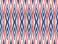 Ikat pattern as ethnic fabric in colorful. Wallpaper seamless pattern design in white, navy blue and orange color. Royalty Free Stock Photo