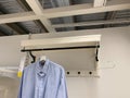 Ikea garderobe with hanger with one blue shirt for sale the price is 45 euros