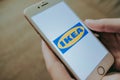 IKEA logo on the smartphone screen.