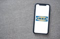 IKEA logo on the smartphone screen.