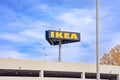 IKEA Sign with blue sky and parking structure in Norfolk, USA