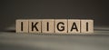 IKIGAI - Japanese concept of a reason for being, life purpose or a reason to wake up, word in letterpress wood cubes, lifestyle,