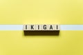 Ikigai word concept on cubes
