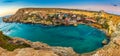 Il-Mellieha, Malta - Panoramic skyline view of the beautiful Popeye Village at Anchor Bay Royalty Free Stock Photo