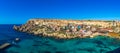 Il-Mellieha, Malta - Panoramic skyline view of the beautiful Popeye Village at Anchor Bay Royalty Free Stock Photo
