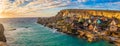 Il-Mellieha, Malta - Panoramic skyline view of the famous Popeye Village at Anchor Bay at sunset