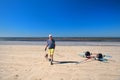 Ile de RÃÂ© - Man and dog on La Couarde sur Mer Royalty Free Stock Photo