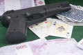 Ilegal poker game with guns on the table Royalty Free Stock Photo