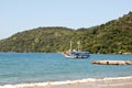 Ilha Grande: Sailboat at coastline near Praia Lopes Mendes, Rio de Janeiro state, Brazil Royalty Free Stock Photo