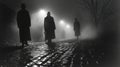 ilhouettes of figures in trench coats emerge from the mist Royalty Free Stock Photo