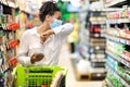 Ill Black Woman Coughing In Elbow Buying Food In Store