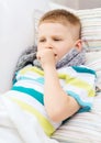 Ill boy with flu at home Royalty Free Stock Photo