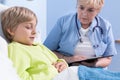 Ill boy in hospital bed Royalty Free Stock Photo