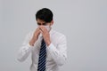 Businessman man feeling sick, sneezing coughing wearing protective mask against cold flu virus bacteria infection pollution Royalty Free Stock Photo