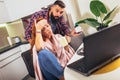 Ill couple having medical teleconsultation using laptop at home Royalty Free Stock Photo