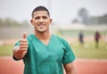 Ill have you back on your feet asap. Cropped portrait of a handsome young male paramedic giving thumbs up while standing