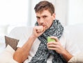 Ill man with flu at home Royalty Free Stock Photo