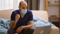 Ill man at home talking online with his doctor Royalty Free Stock Photo