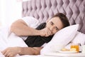 Ill man suffering from cough in bed Royalty Free Stock Photo
