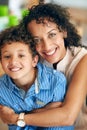 Ill never let you go. Portrait of a happy mother posing with her adorable little boy at home. Royalty Free Stock Photo