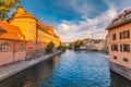 River at sunset and Public Elementary St. Thomas School building in Strasbourg Royalty Free Stock Photo