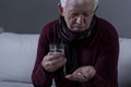 Ill senior man taking medicament Royalty Free Stock Photo