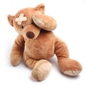 Ill teddy bear with plaster on its head Royalty Free Stock Photo