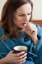 Ill woman drinking tea Royalty Free Stock Photo