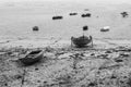 Small fishing boats, beached on the beach.