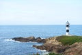 Illa Pancha lighthouse in Ribadeo, Galicia, Spain Royalty Free Stock Photo