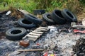 Illegal dumping of used tire Royalty Free Stock Photo