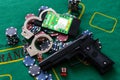 Illegal gambling concept handgun with betting chips.