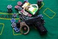 Illegal gambling concept handgun with betting chips. Royalty Free Stock Photo