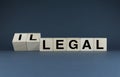 Illegal or legal. The cubes form the words Illegal or Legal Royalty Free Stock Photo