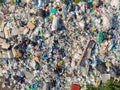 Illegal storage of solid household waste, plastic bottles and garbage bags. Land pollution Aerial top view Royalty Free Stock Photo