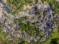 Illegal storage of solid household waste, plastic bottles and garbage bags. Land pollution Aerial top view Royalty Free Stock Photo