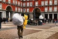 Illegal street vendors in La Plaza Mayor in Madrid