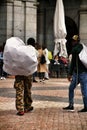 Illegal street vendors in La Plaza Mayor in Madrid Royalty Free Stock Photo