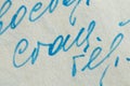 Illegible handwritten font written in pen on old paper in Russian as background macro