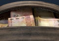 Illicit Cash In A Brown Duffel Bag