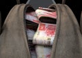 Illicit Cash In A Brown Duffel Bag Royalty Free Stock Photo