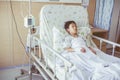 Illness asian child admitted in the hospital with infusion pump