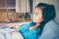 Illness asian child admitted in hospital with saline intravenous