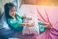 Illness asian child admitted in hospital with saline intravenous