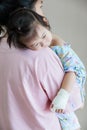 Illness child in hospital, saline intravenous (IV) on hand asian