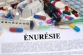 Enuresis concept written in French with drugs